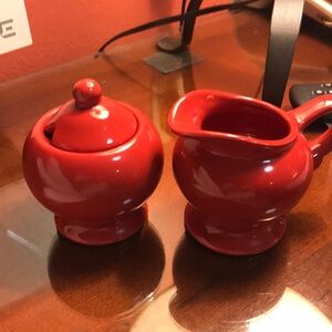 Red  pottery creamer and sugar bowl